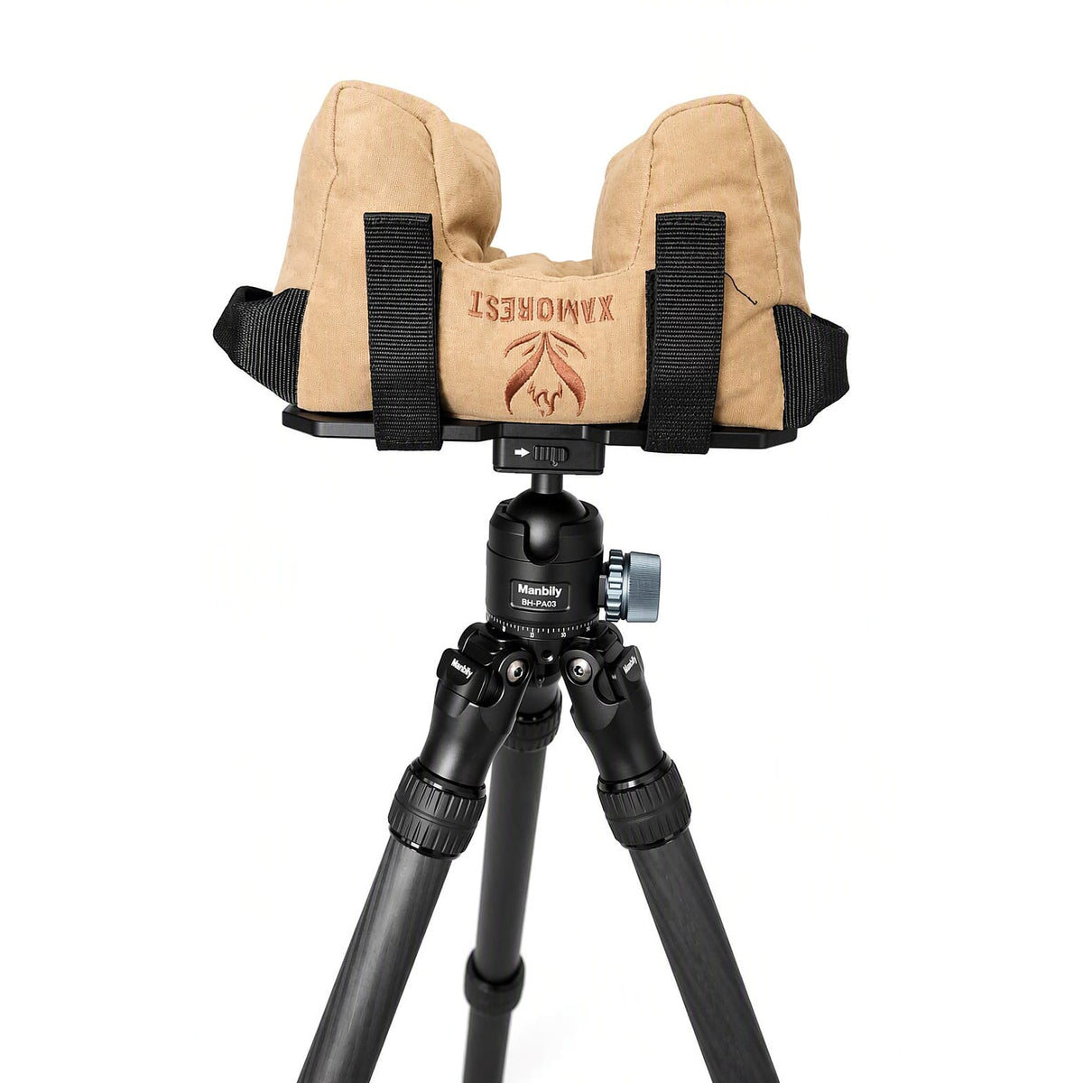 Tan shooting rest bag strapped to an Arca shooting plate on a carbon fibre tripod